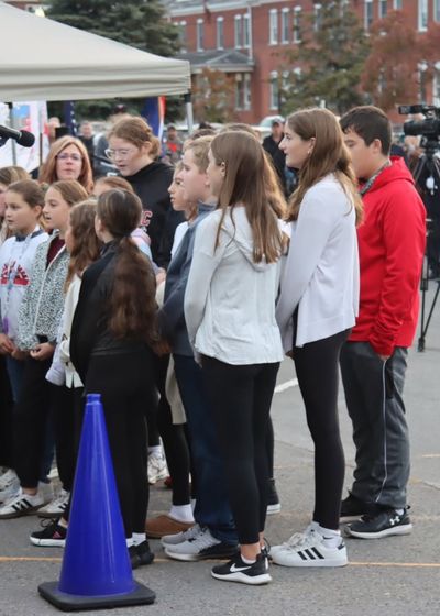 children's choir singing at an Honor Flight ceremony
