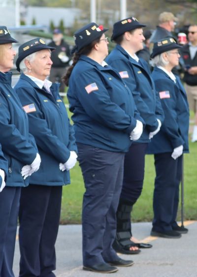 honor guard standing at attention before an Honor Flight